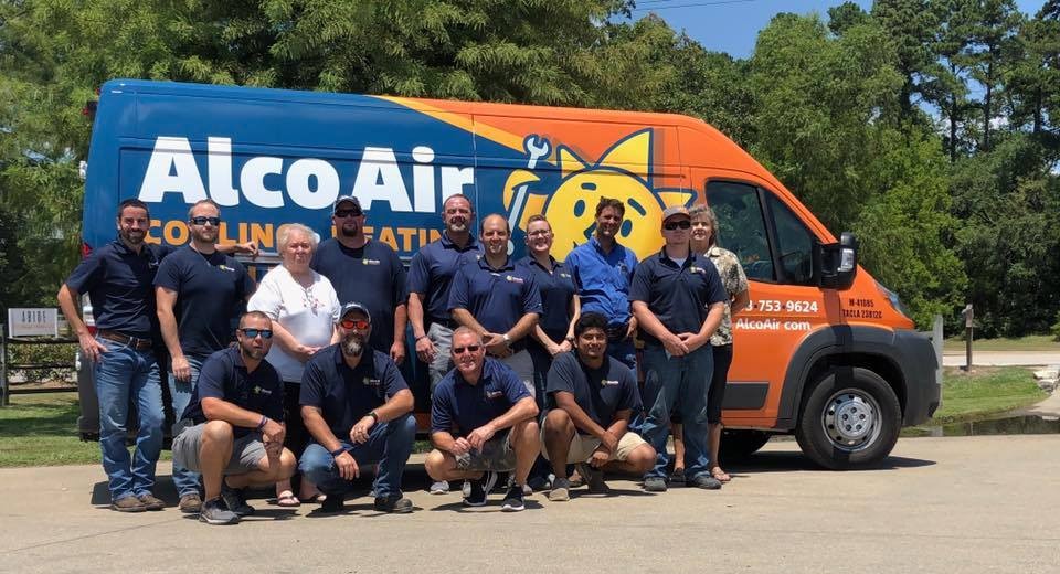 Alco Air team standing in front of Alco van